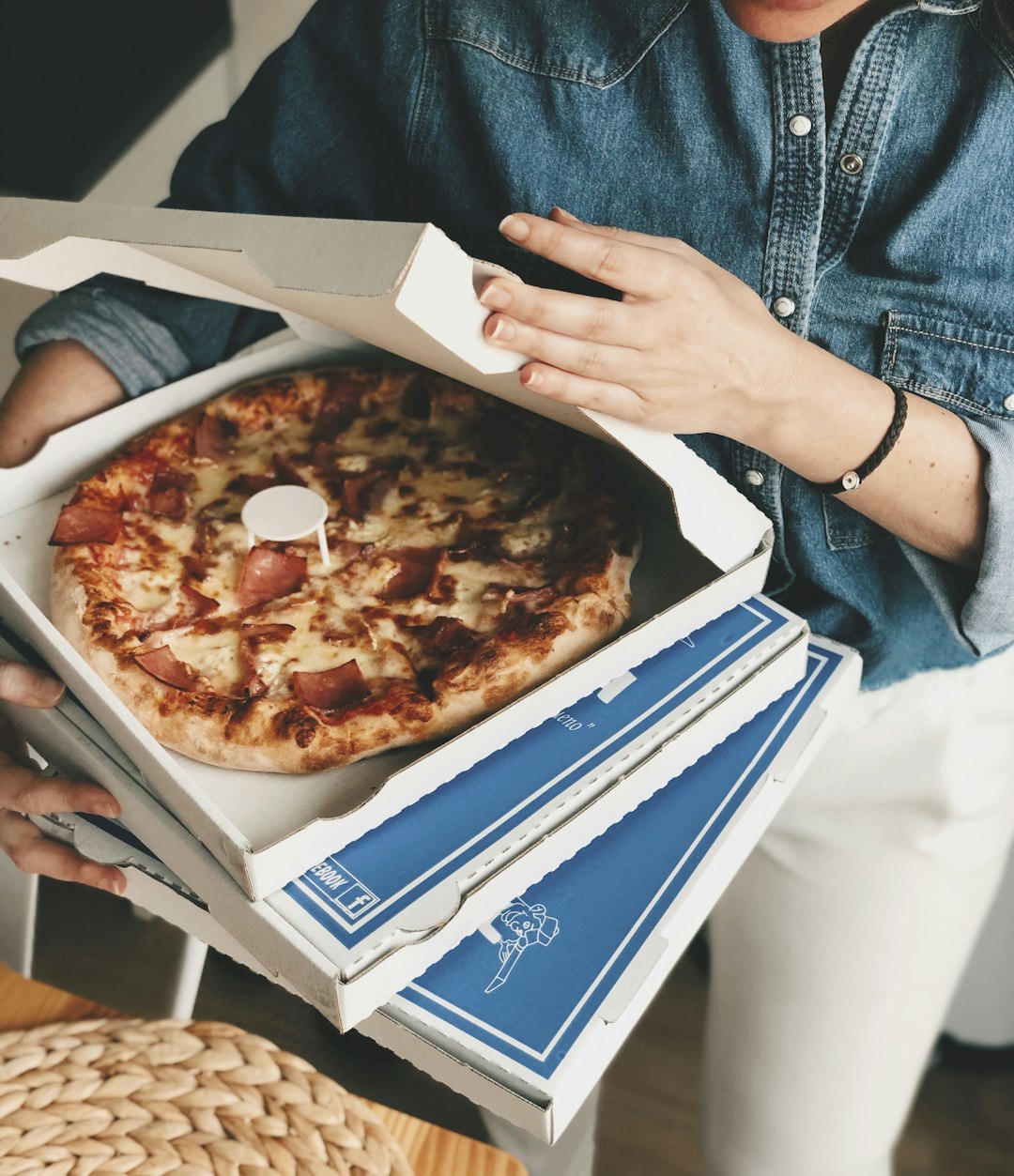 Delicious pizza being delivered